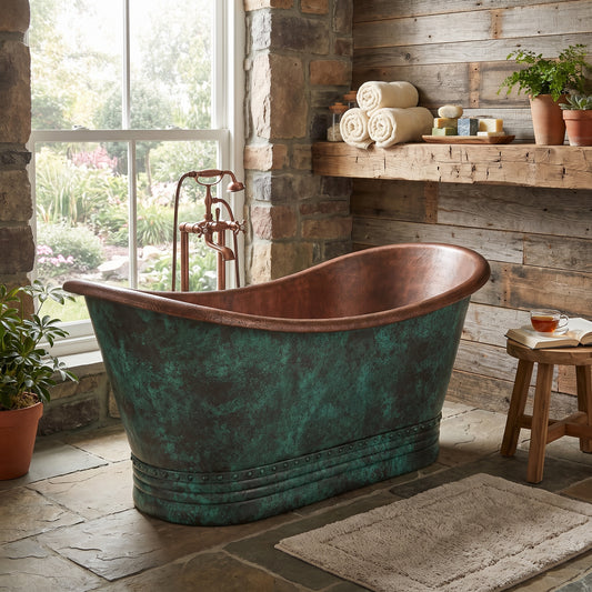The Patina Bath brass soaking bathtub beside a garden window in a rustic stone-and-wood bathroom