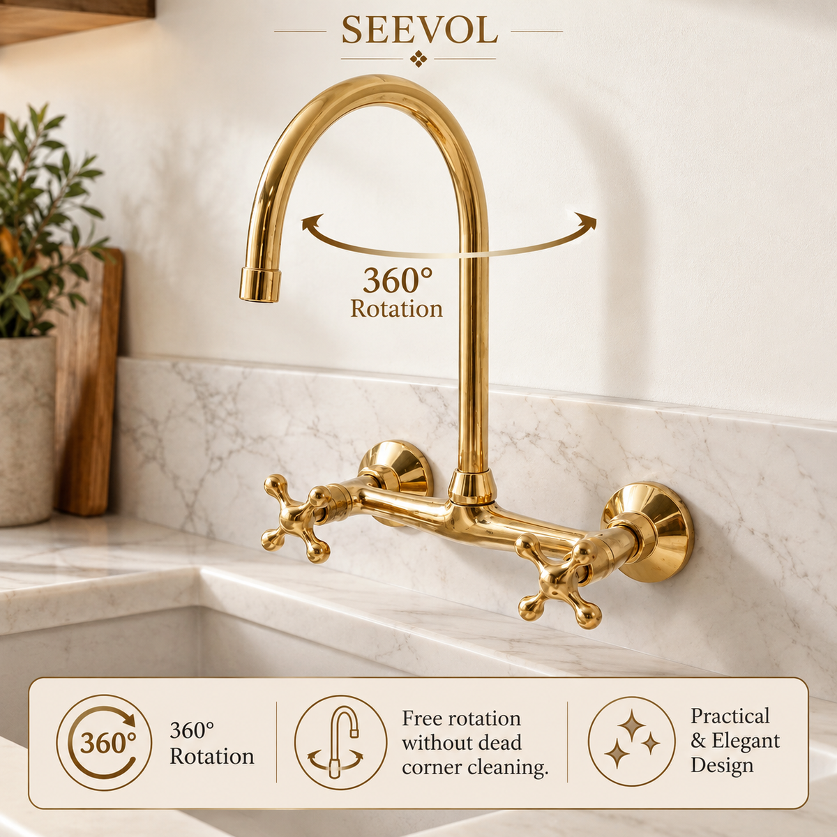 Brass wall-mount kitchen faucet over a sink beside a potted fern