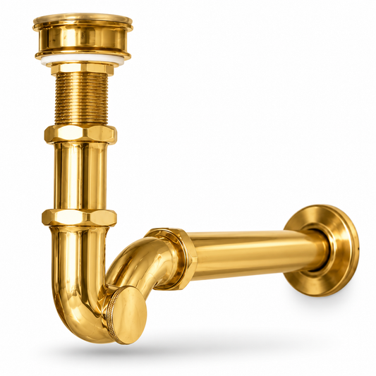 A polished gold brass plumbing pipe assembly with a wall-mounted flange, elbow joint, threaded section, and drain cap, shown on a clean white background.