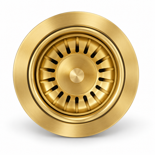 Unlacquered brass kitchen sink strainer basket with radial slots and central stopper knob, top view on white