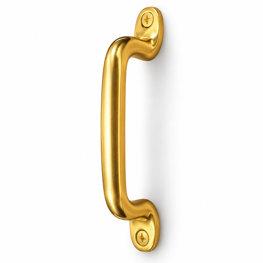 Unlacquered brass cabinet pull with a curved handle and exposed mounting screws, shown at an angle on white