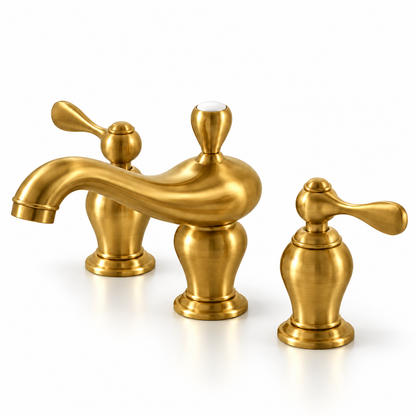 Angled view of the traditional unlacquered brass widespread bathroom faucet with curved spout and lever handles on white